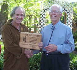 Eddie receiving the Western Trails Historical Society Poet Laureate Award