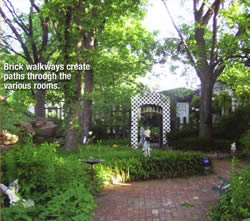 Brick walkways create paths through garden rooms